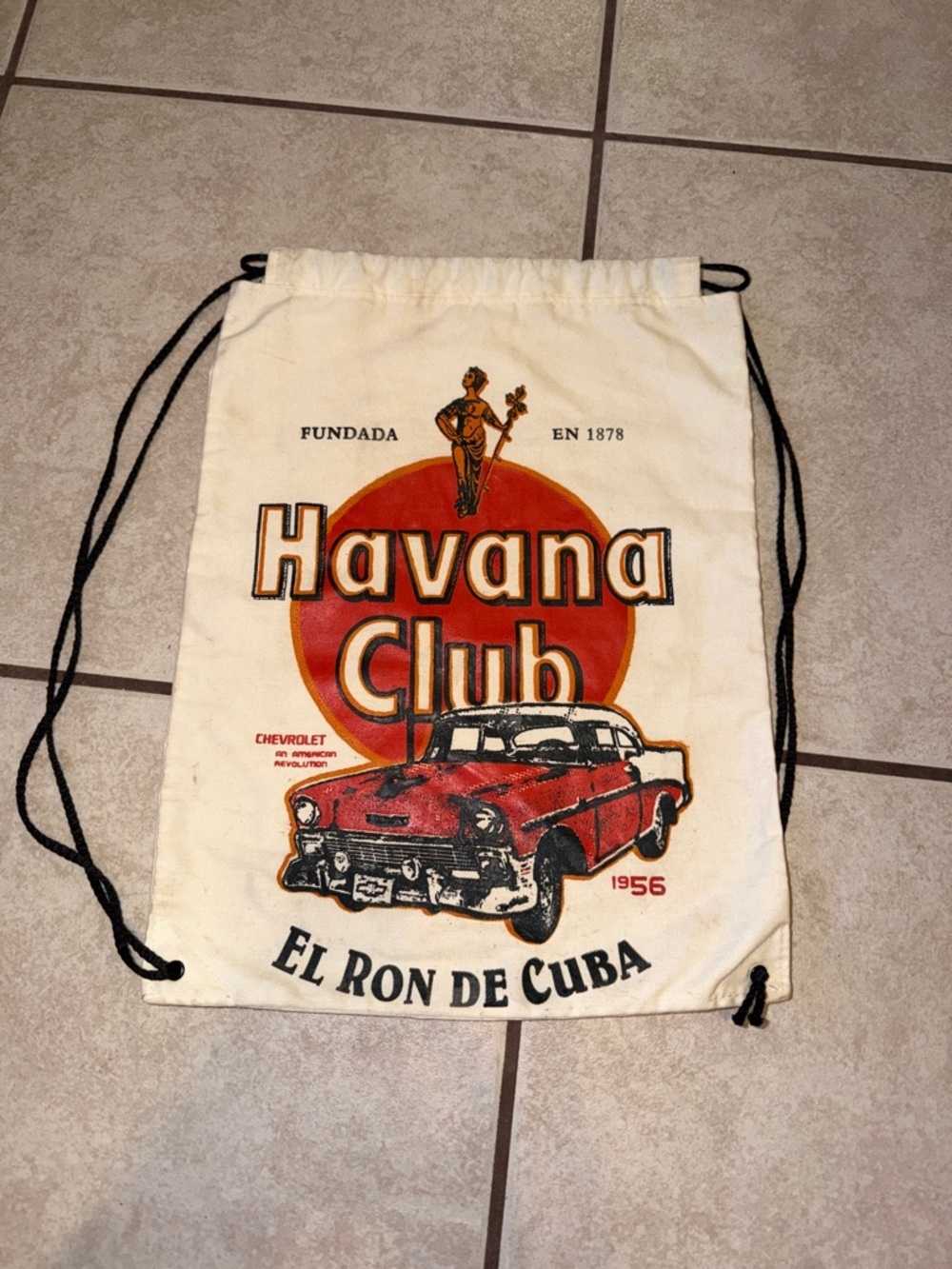 Cream Drawstring Backpack with Red Graphic
